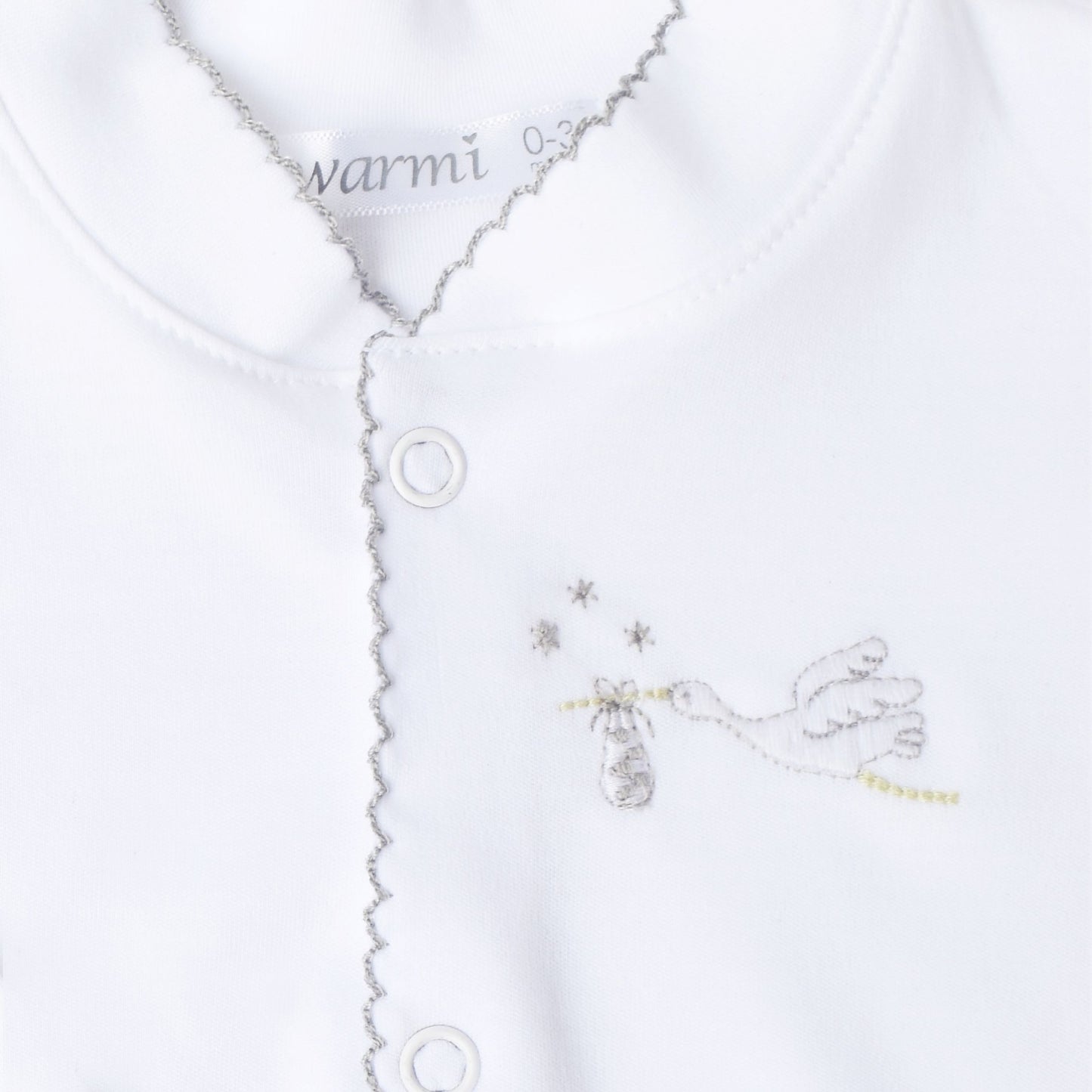 Warmi Enterito Picueta Blanco Bordado Cigueñas